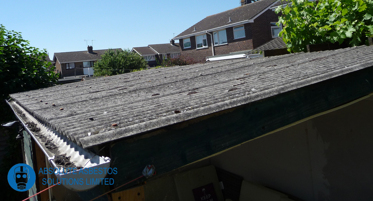 Asbestos corrugated cement roof on a garage roof